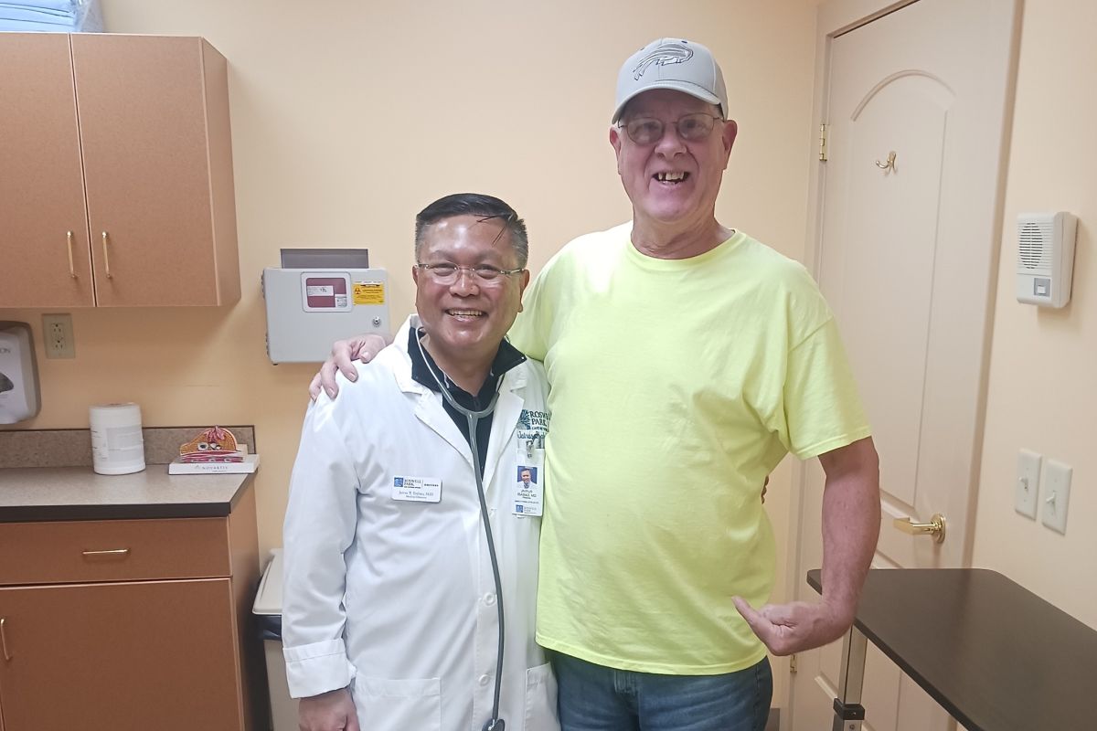 Photo of Randy Rothwell with Dr. Ibabao