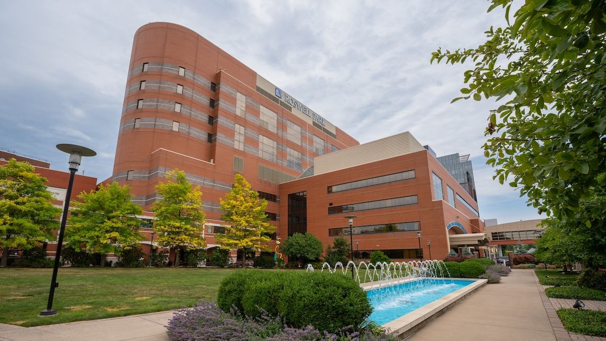 A hospital viewed from a park