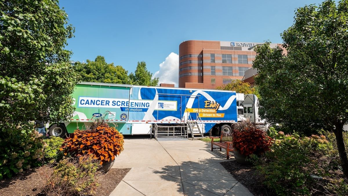 Mobile lung screening trailer in front of a hospital